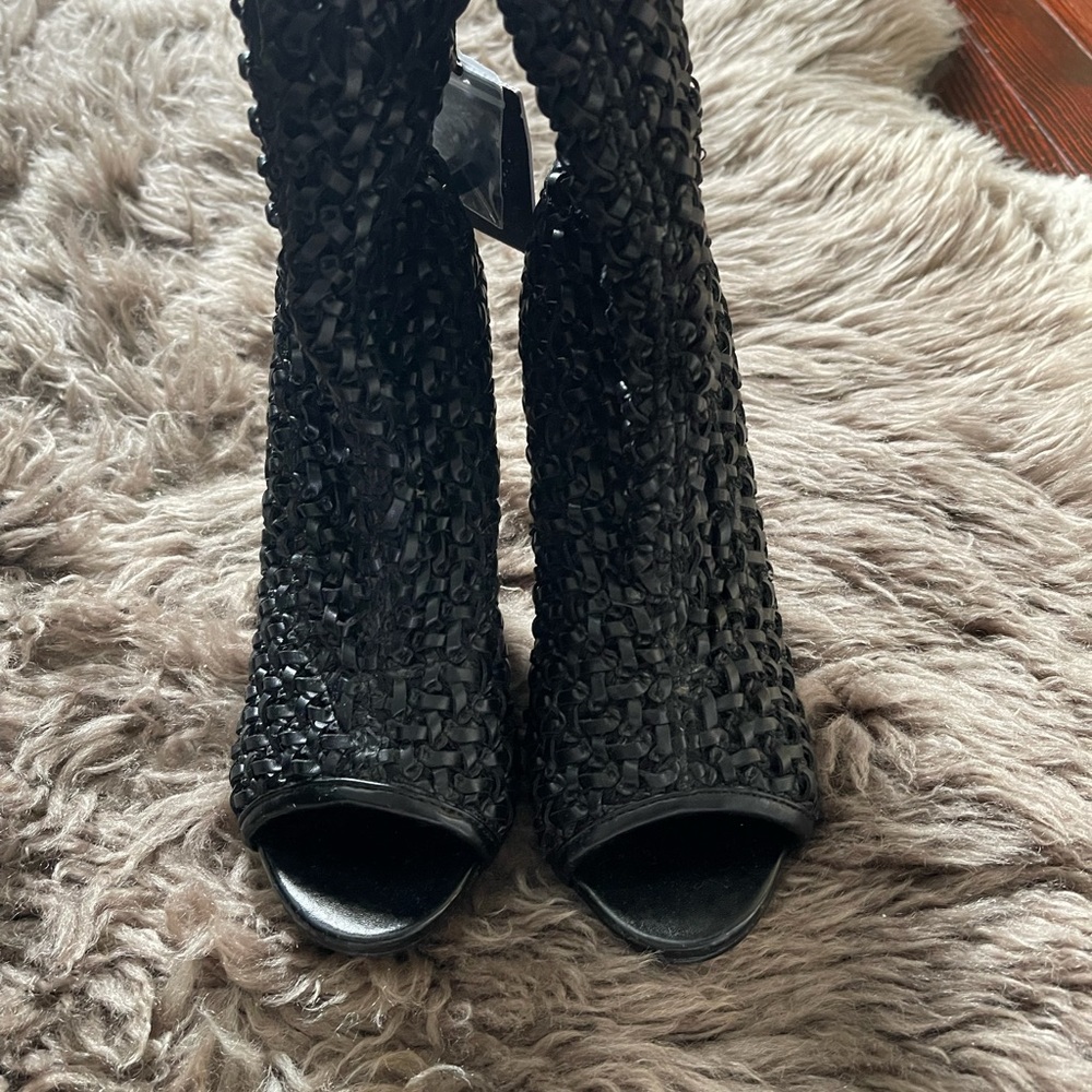 Beautiful Zara peep toe booties .Please see pic woven undone not noticeable .